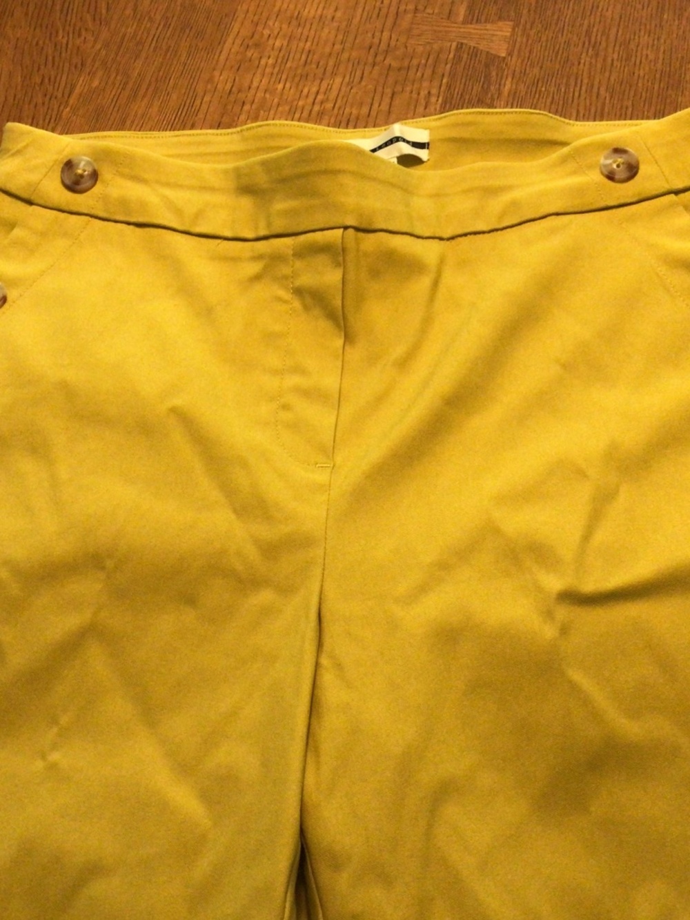 Maize color chino with sailor horn look button sides for detail. EUC.